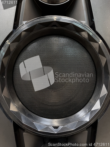 Image of Musical speaker with protective grill