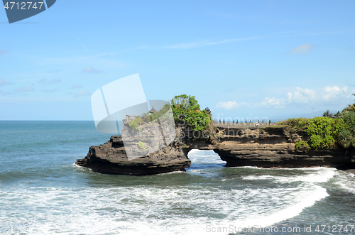 Image of Pura Batu Bolong in the rock in Bali, Indonesia