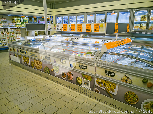 Image of Refrigerator with frozen foods and dairy products