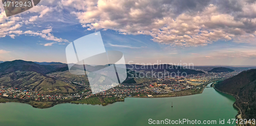 Image of Aerial view of villages  and small city near river