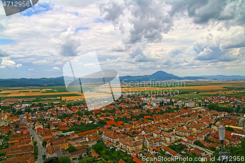 Image of Small city landscape rounded by fields