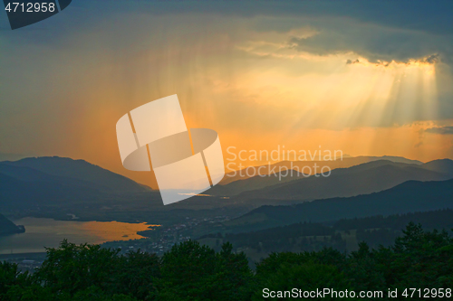 Image of Golden sunset and summer rain