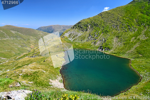 Image of Clear alpine lake scene in Romanian Carpathians