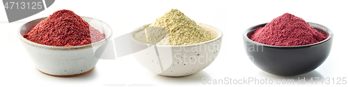 Image of bowls of various dried plant powder