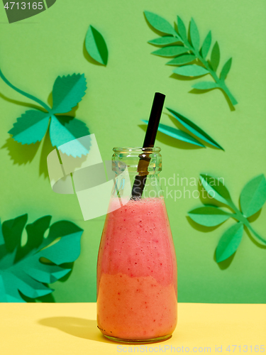 Image of bottle of pink smoothie