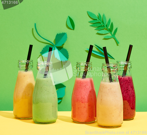 Image of bottles of various colorful smoothies