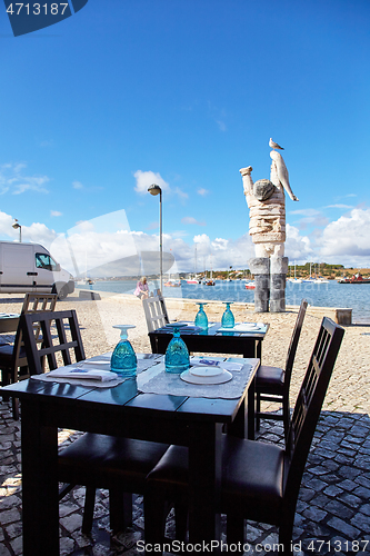 Image of served fish restaurant table