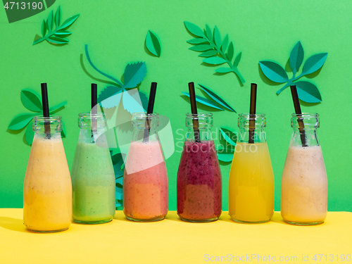 Image of bottles of various colorful smoothies