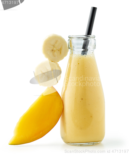 Image of bottle of yellow smoothie