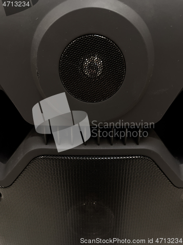Image of Musical speaker with protective grill
