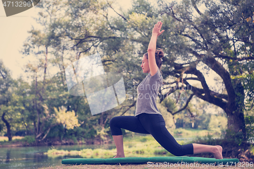 Image of woman meditating and doing yoga exercise