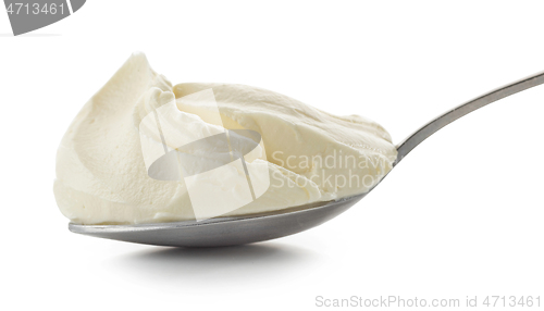 Image of spoon of cream cheese