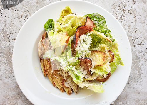 Image of portion of cesar salad with chicken