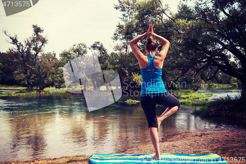 Image of woman meditating and doing yoga exercise