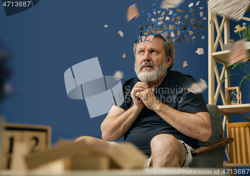 Image of Old bearded man with alzheimer desease