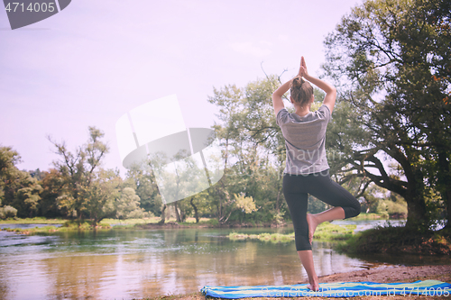 Image of woman meditating and doing yoga exercise