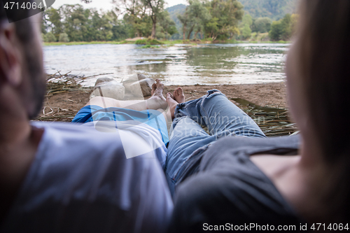 Image of couple spending time together in straw tent