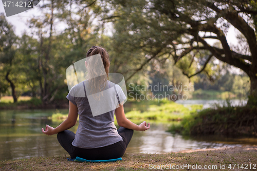 Image of woman meditating and doing yoga exercise