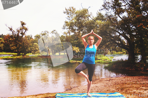 Image of woman meditating and doing yoga exercise