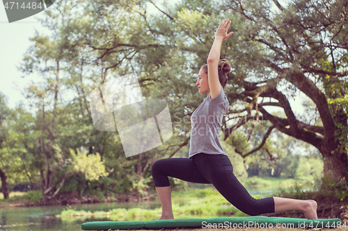 Image of woman meditating and doing yoga exercise