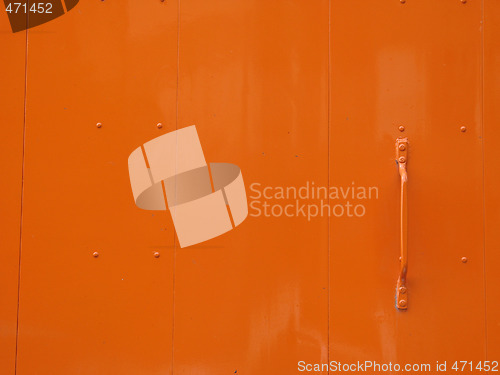 Image of slick orange metal door