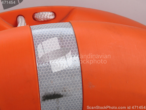 Image of orange buoy close up