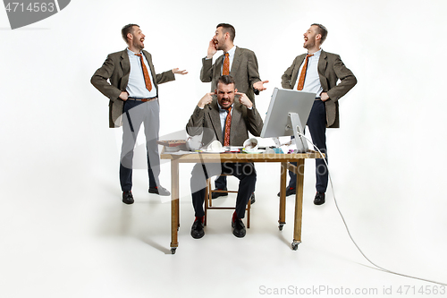 Image of The young man suffering form colleagues