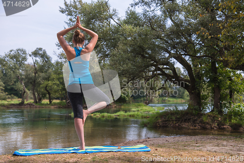 Image of woman meditating and doing yoga exercise