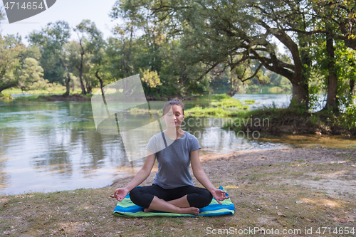 Image of woman meditating and doing yoga exercise