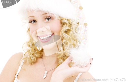 Image of cheerful santa helper girl