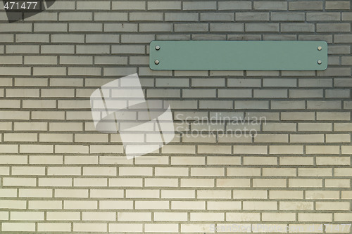 Image of Empty sign on a brick wall