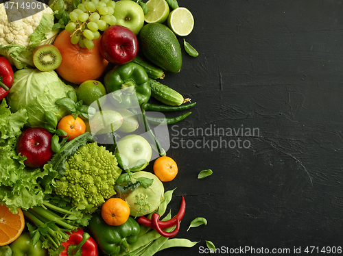 Image of Healthy food dish on black stone background