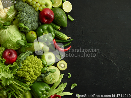 Image of Healthy food dish on black stone background