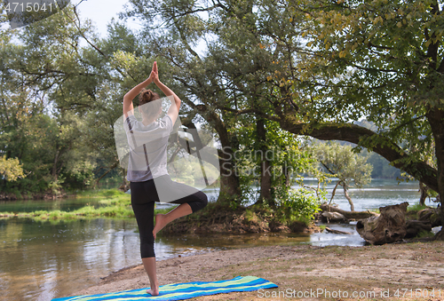 Image of woman meditating and doing yoga exercise