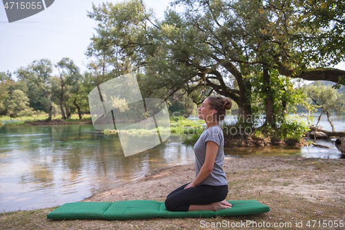 Image of woman meditating and doing yoga exercise