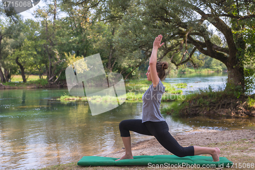 Image of woman meditating and doing yoga exercise