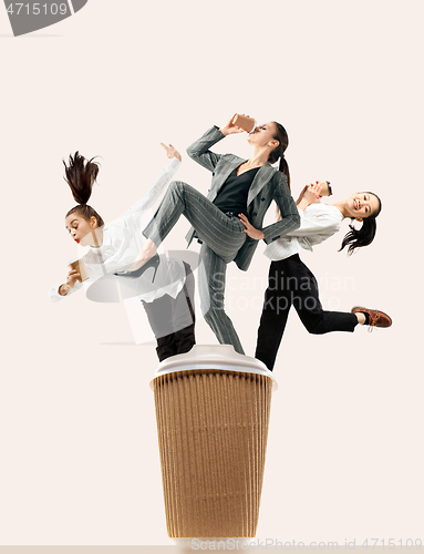 Image of Office workers jumping isolated on studio background