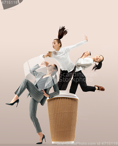 Image of Office workers jumping isolated on studio background