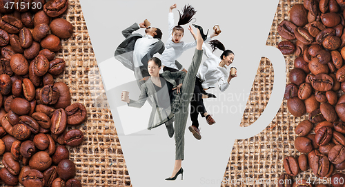 Image of Office workers jumping isolated on studio background