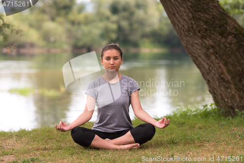 Image of woman meditating and doing yoga exercise