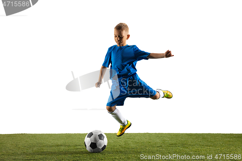 Image of Young boy as a soccer or football player on white studio background