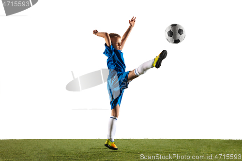 Image of Young boy as a soccer or football player on white studio background