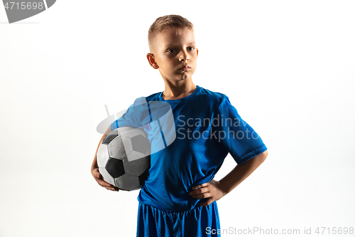 Image of Young boy as a soccer or football player on white studio background