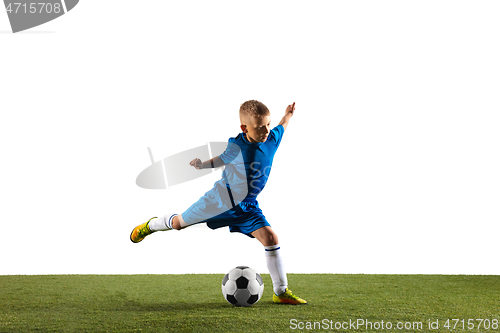 Image of Young boy as a soccer or football player on white studio background