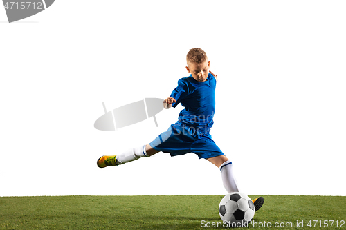 Image of Young boy as a soccer or football player on white studio background