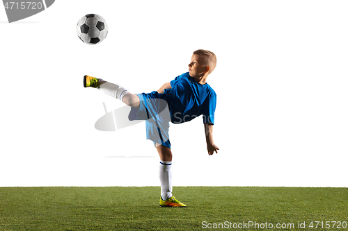 Image of Young boy as a soccer or football player on white studio background