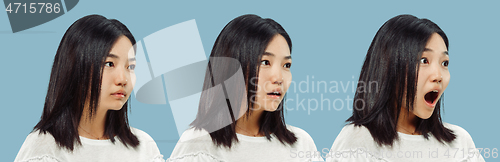 Image of Korean young woman\'s half-length portrait on blue background