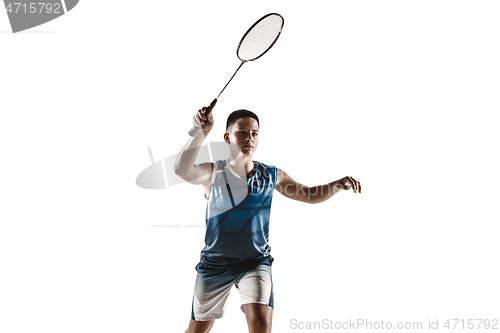 Image of Little boy playing badminton isolated on white studio background