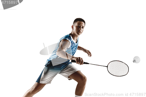 Image of Little boy playing badminton isolated on white studio background