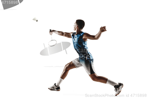 Image of Little boy playing badminton isolated on white studio background